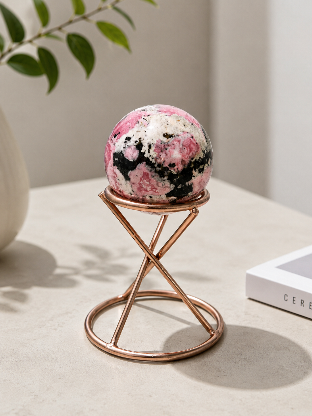 Premium Natural Rhodonite Crystal Sphere with Rose Gold Stand