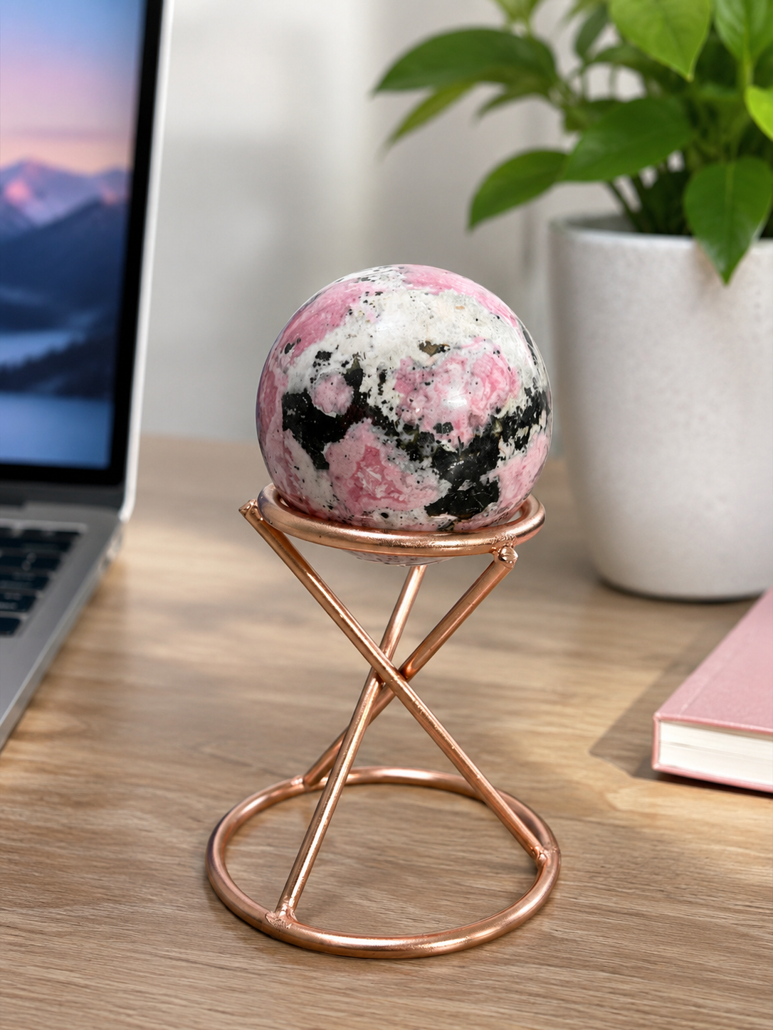 Premium Natural Rhodonite Crystal Sphere with Rose Gold Stand